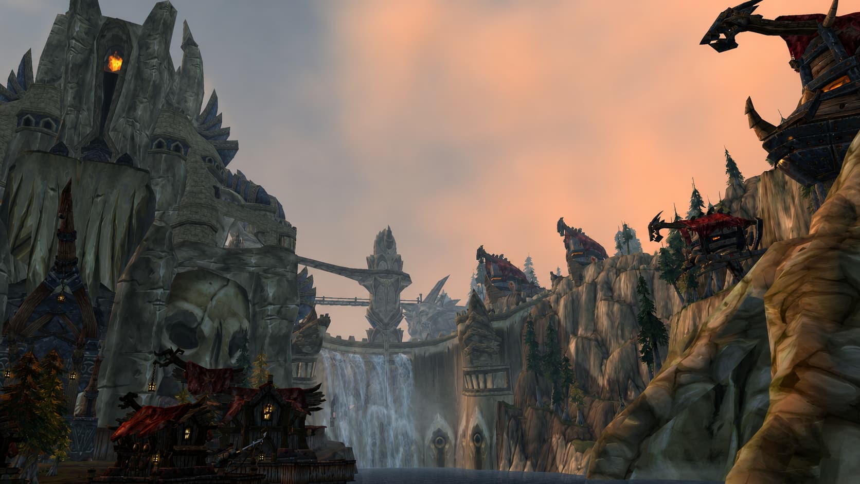 Howling Fjord cliffs, Vrykul architecture, and waterfalls at sunset